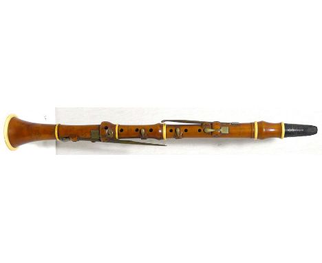 Early 19th century boxwood and ivory clarinet by D'Almaine. Eight square ended brass keys. Good condition, no cracks apparent