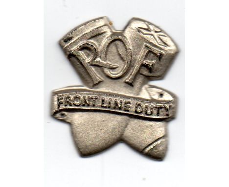  WW2 badge from Royal Ordnance Factory, bakelite economy badge. Features design of two bullets crossed over each other with w