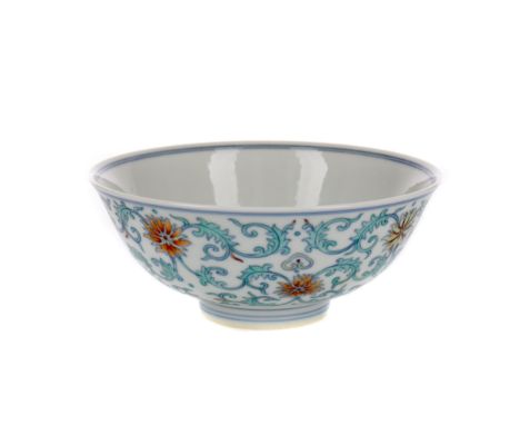 20TH CENTURY CHINESE BOWL, of circular form, painted with scrolling foliate designs on a white ground, painted seal mark in b