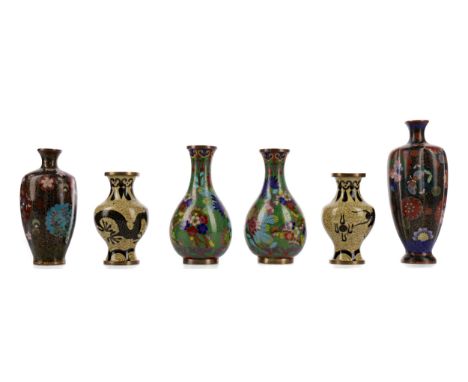 TWO PAIRS OF EARLY 20TH CENTURY CHINESE CLOISONNE ENAMEL VASES, one pair with floral decoration, 13.5cm high, the other pair 
