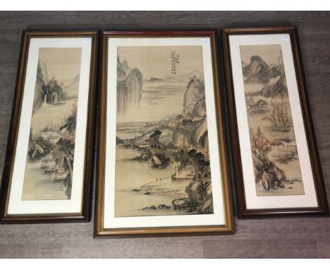 20TH CENTURY CHINESE PAINTING ON SILK, a triptych depicting a mountaneous landscape with pavillions by a lake, in three frame