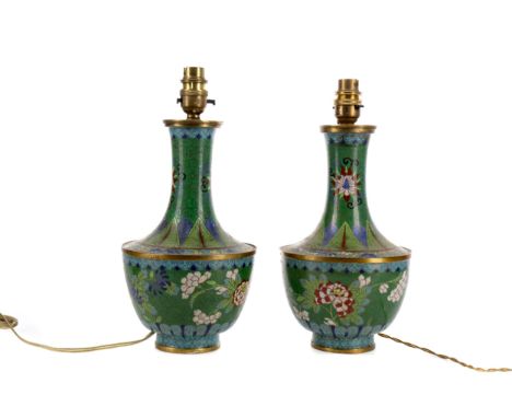PAIR OF EARLY 20TH CENTURY CHINESE CLOISONNE ENAMEL VASES, converted to lamps and drilled for electricity, with floral decora