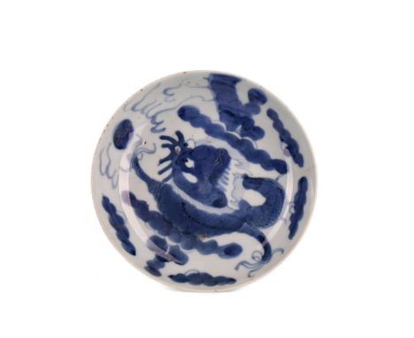 EARLY 20TH CENTURY CHINESE BLUE AND WHITE CIRCULAR DISH, painted with dragon and pearl, 15.5cm diameter Provenance: A Private