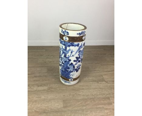 LATE 19TH CENTURY CHINESE BLUE AND WHITE STONEWARE STICK STAND, of cylindrical form, painted with birds and foliage in shades