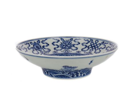 20TH CENTURY CHINESE BOWL, of circular form, painted with fish and other designs in shades of blue on a white ground, painted