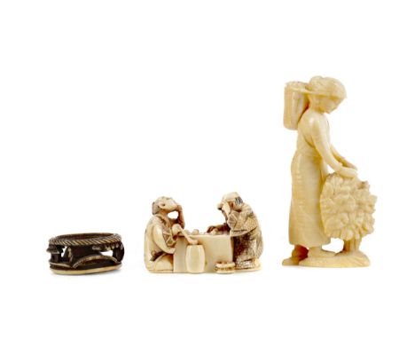 JAPANESE IVORY NETSUKE, late Meiji period, modelled as two men playing a draughts-type game, incised two character mark to ba