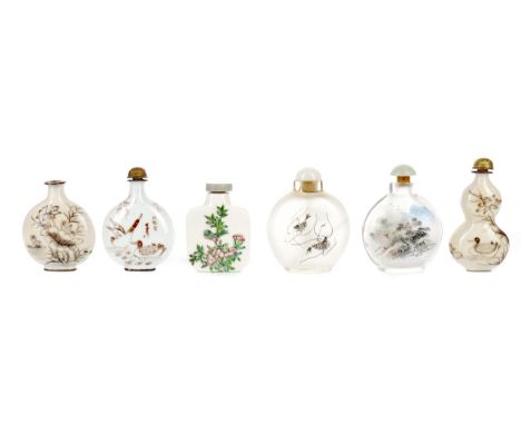 TWO 20TH CENTURY CHINESE INTERIOR PAINTED GLASS SNUFF BOTTLES, with stoppers, each 6.5cm high, along with four ceramic snuff 