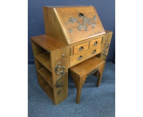 20TH CENTURY CHINESE BUREAU, c.1930s, the hinged writing flap and side panels carved in relief with dragons chasing a pearl, 