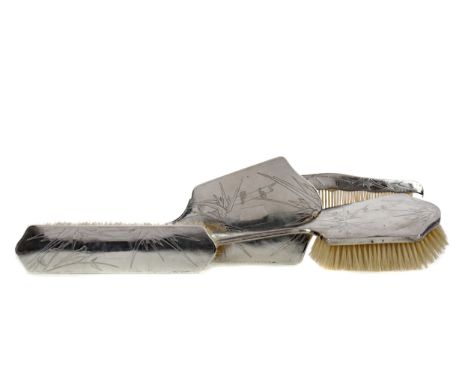 CHINESE SILVER FOUR PIECE VANITY SET, comprising hand mirror, two brushes and a comb, three pieces stamped (4)
