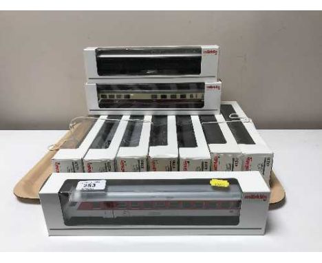 Ten Marklin carriages numbers 43303, 42271, 42971, 42861, 42972, 43119, 43211, 43221 and two 43110, HO scale, all parts boxed