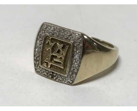 A 9ct gold diamond set Gentleman's ring, 6.8g.