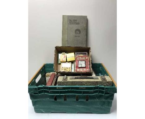 A box of vintage games and puzzles, playing cards etc, together with an Ever Ready radio receiver in case and a box of books