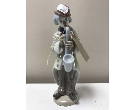 A Lladro figure of a Clown playing a Saxophone No. 5471