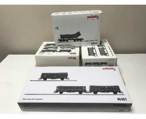 Two Marklin freight car sets 46401  and 46080 together with three other car sets 46802, 46195 and 48684, HO scale all parts b