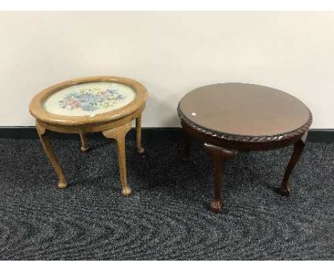 A circular oak tapestry topped coffee table on cabriole legs together with circular coffee table on claw and ball feet 