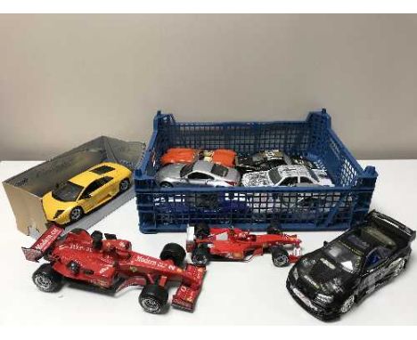 Two crates of large scale die cast sports cars, Burago etc