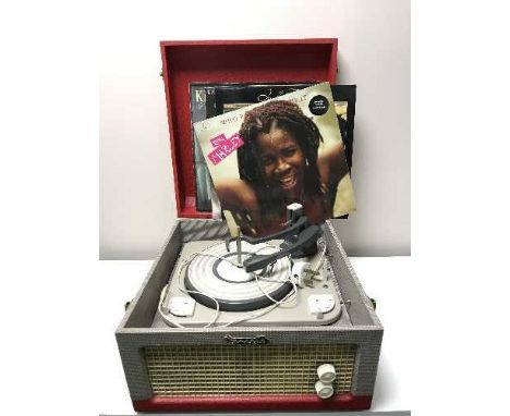 A mid twentieth century Dansette table top record player together with a box of lps