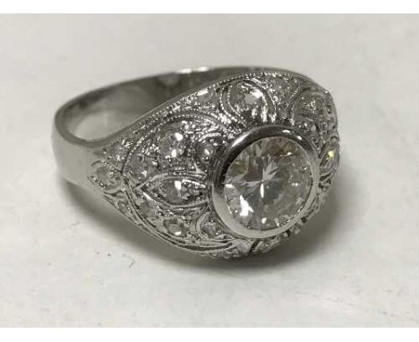 A white gold diamond bombay style ring, the central stone approximately 1ct, size M.