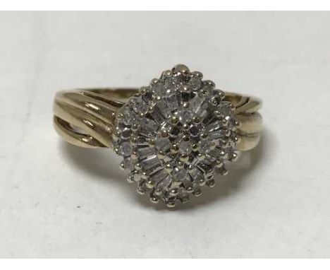 A 9ct gold diamond cluster ring, 3.8g.