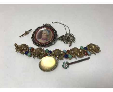 A collection of costume and vintage jewellery, Egyptian revival bracelet etc.