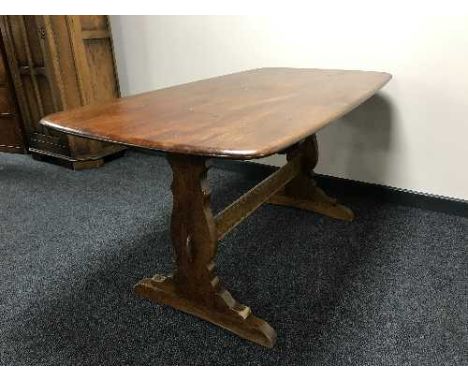 An Ercol refectory dining table 