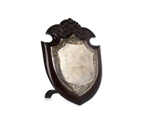 20TH CENTURY CHINESE SILVER FRONTED HARDWOOD PRESENTATION SHIELDwith engraved character writing within borders of birds and g