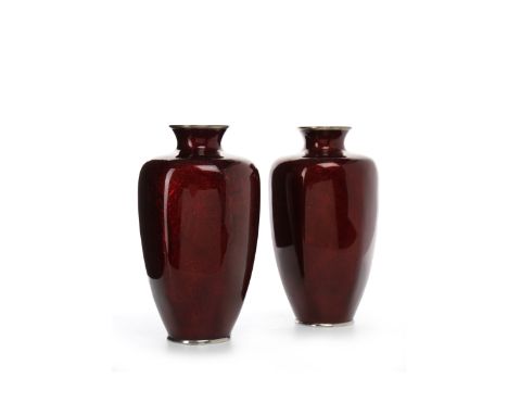 PAIR OF EARLY 20TH CENTURY JAPANESE CLOISONNE VASESof hexagonal form, decorated in red enamel with foliage design, 21.5cm hig