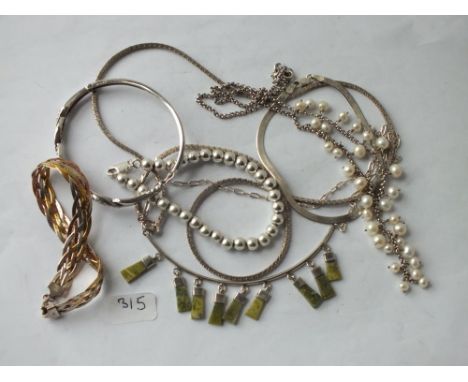 Silver bangle, neck chains etc. – 74gms     