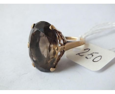 Gold mounted smoky quartz ring     