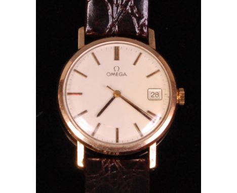 A 1960s Omega gents 9ct gold cased wristwatch, having a signed silvered dial with baton markers, date aperture and manual win