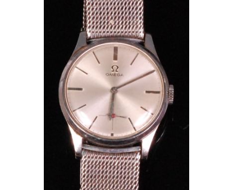 An Omega steel cased gents wristwatch, having a signed silvered dial with baton markers, subsidiary seconds dial and manual w