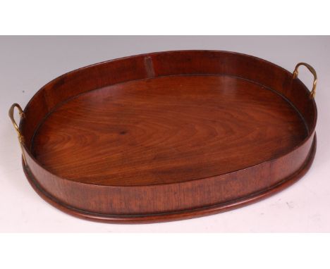 A George III mahogany gallery tray, of oval form, with twin brass carry handles, w.49cm Condition Report / Extra Information 