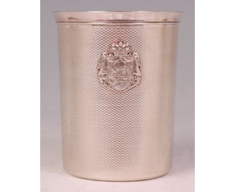 A Russian silver vodka beaker, bearing coat of arms and having engine turned decoration, 3.1oz, with 84 silver assay and stam