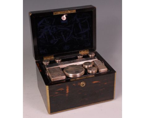 A William IV coromandel fitted travelling toilet box, the brass bound box with fitted double lever lock by S Mordan & Co of L