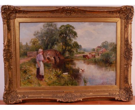 Ernest Walbourn (1872-1927) - Feeding the ducks from the river Frome, Dorchester, oil on canvas, signed lower right, 50 x 75c