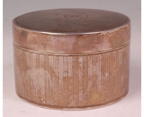 A 19th century Chinese Canton silver box and cover, of engine turned circular form, marked verso CC, 6.2oz, dia. 9cm