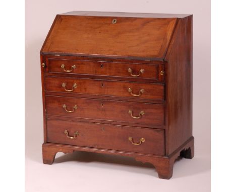 A George III mahogany writing bureau, the sloping fall enclosing a well-fitted interior above four long graduated drawers, w.