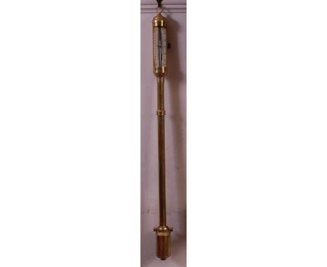 A lacquered brass cased ships gimbled stick barometer, having silvered scale, 96cm