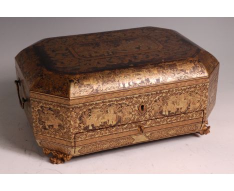 An early 19th century Chinese export gilt and black lacquer decorated needlework box, of octagonal form, the whole profusely 