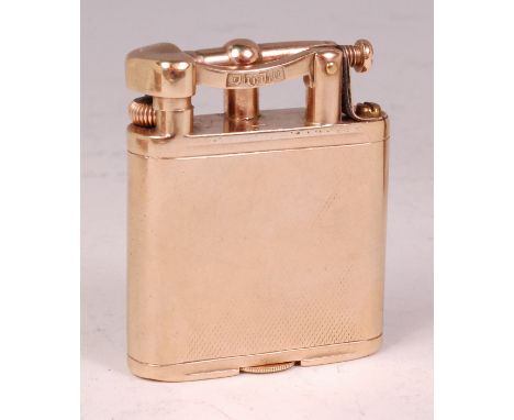 A Dunhill 9ct gold pocket cigarette lighter, having roller strike mechanism with flip-top arm, the case with engine turned de