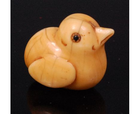 A Japanese carved ivory netsuke, of a small chick, having hardstone set eyes, signed Gyoku?, Meiji period, w.3cm Condition Re