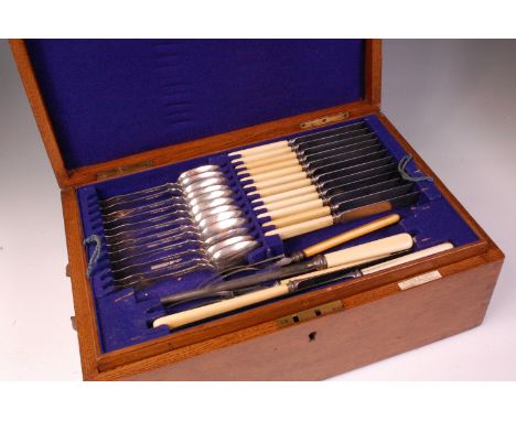 A Victorian Scottish silver Kings pattern harlequin twelve place setting cutlery suite, in fitted oak canteen, comprising; ta