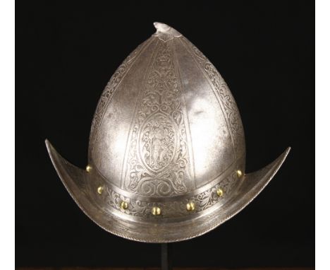 A Renaissance Style Cabasset Helmet with panels of etched decoration. 