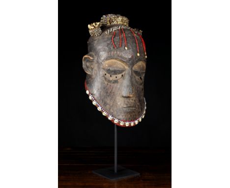 A Beautiful 19th Century Kuba Kete Helmet Mask. This was collected from a village in Mushenge and owned by one of the elders 