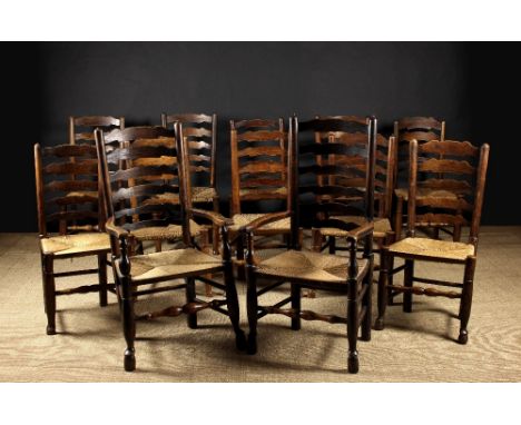 A Harlequin Set of Twelve Wavy Ladder Backed Chairs including two carvers, attributed to Lancashire.  Each chair having five 