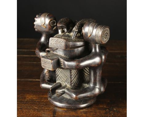 A Late 20th Century Luba Pot, traditionally used to make and store herbal medicines. This piece has a male and female figure 