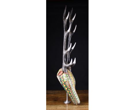 A Mid/Late 20th Century Bozo Antelope Mask from Mali. The coming forth of masks and puppets is a ritual festivity practised a