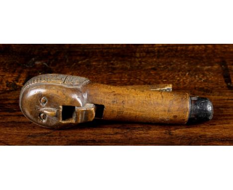 A Fine Late 17th Century Treen Figural Walking Stick Handle/Lever Nutcracker, carved in the form of a head with hinged jaw an