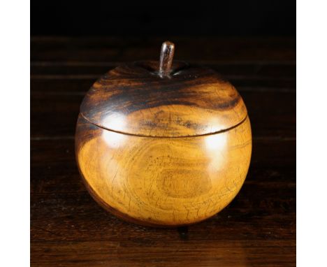 A Large Treen Lignum Apple-form Caddy/Tobacco Jar, 5 ins (13 cms) in height.