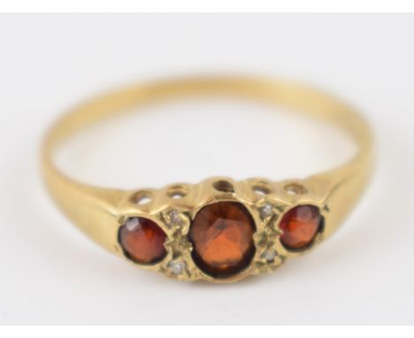 9ct gold diamond and garnet ring, 2.0 grams, size T.  